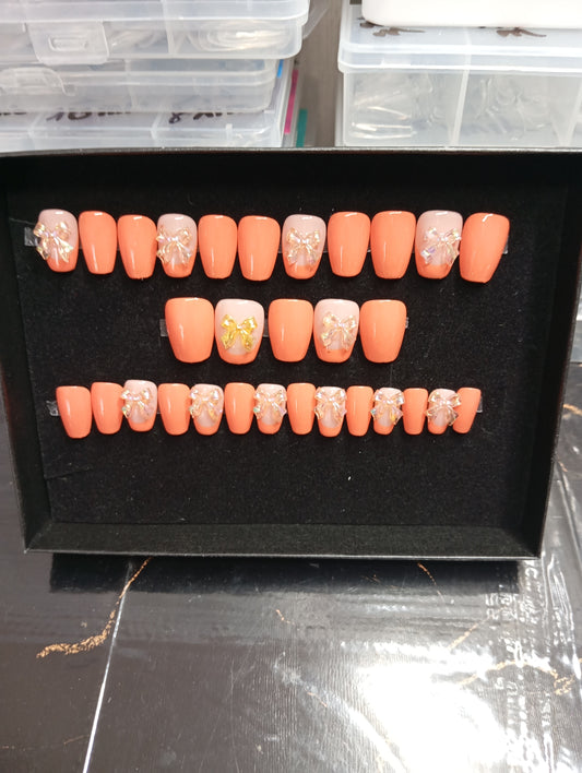 🎀 Corail Nœud Doré